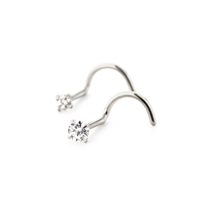 Nose screw made of titanium with prong set stone