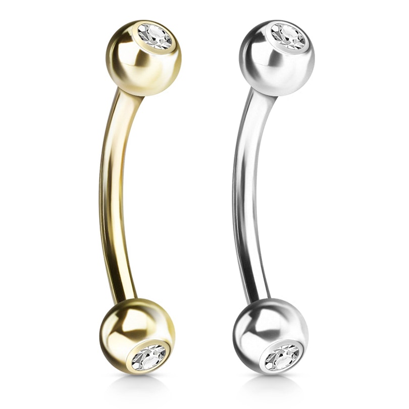 Curved barbell made of 14k gold with bezel-set stones
