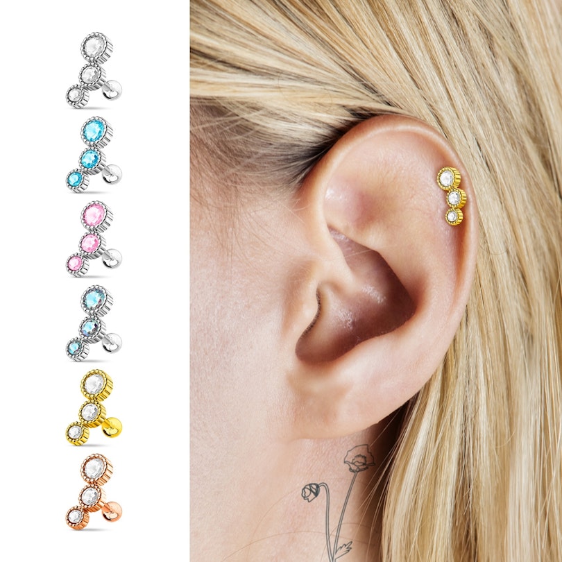 Helix piercing with 3 round stones in different sizes