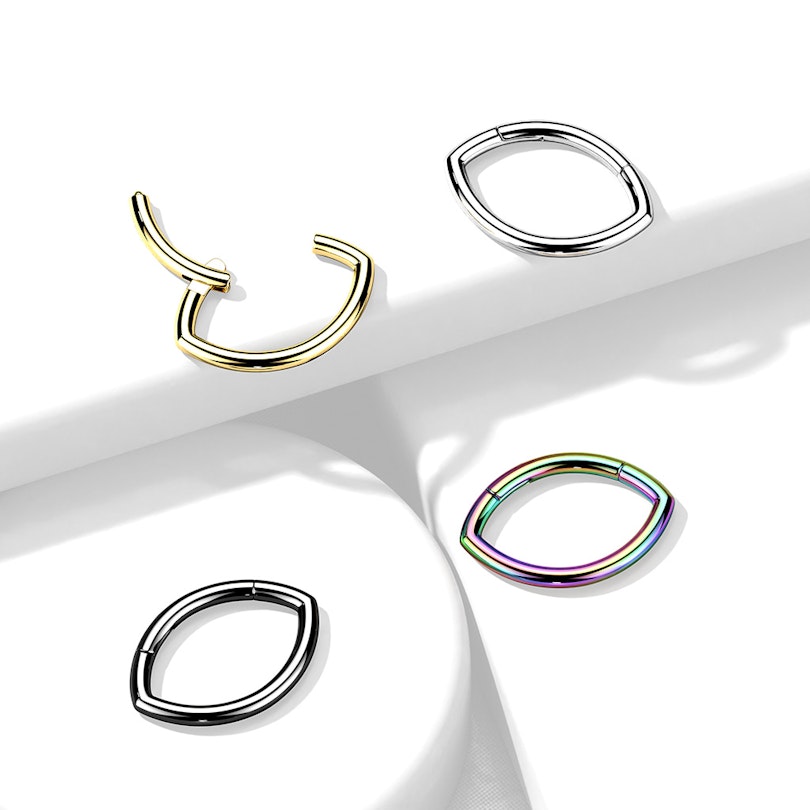 Oval-shaped hinged ring made of titanium