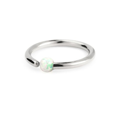 Ring with fixed opal stone