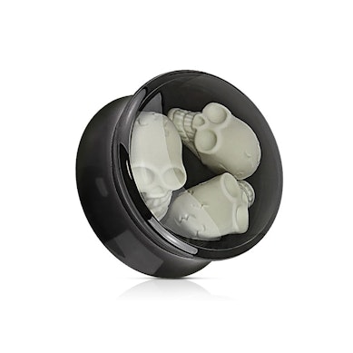 Plug made of acrylic with three skulls