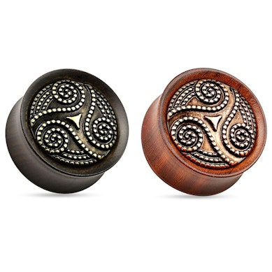 Plug with dotted tribal pattern on wood