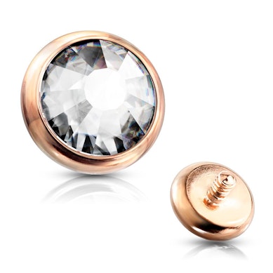 Dermal top jewelry in a variety of colors with crystal stone.