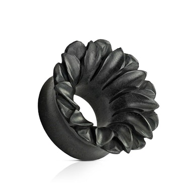Tunnel in black organic wood as a flower