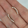 Barbell with curved top and clear stones Piercings
