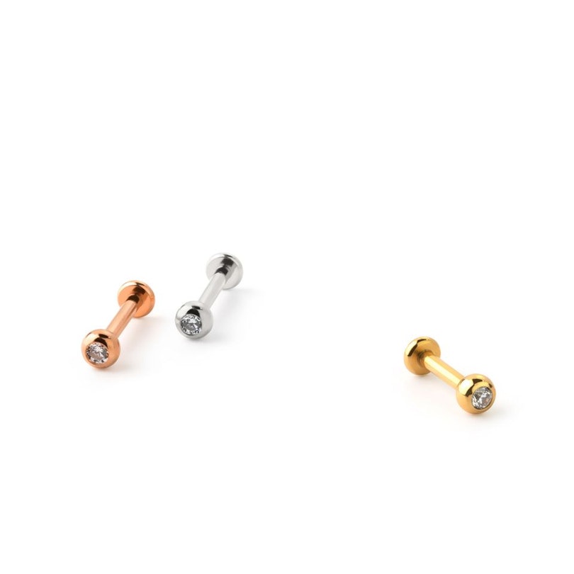 Labret made of titanium with internal threading and jeweled ball Piercings