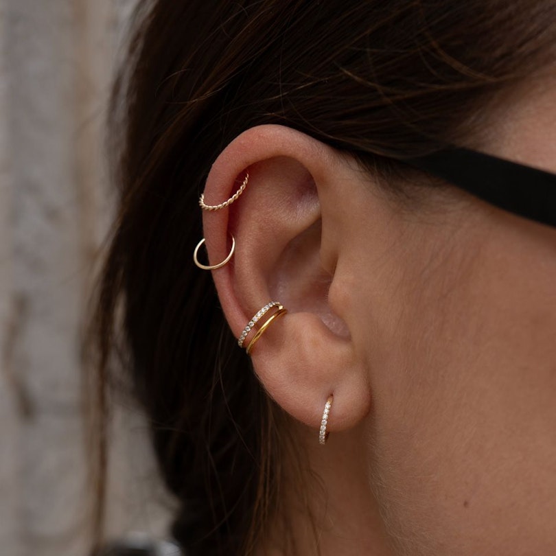 Seamless ring made of 14k gold Piercings