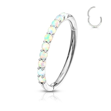 Clicker ring made of 14k gold with opalites