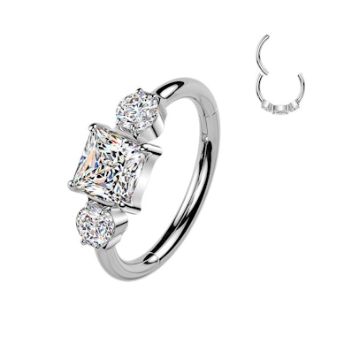 Titanium hinged ring with three CZ stones