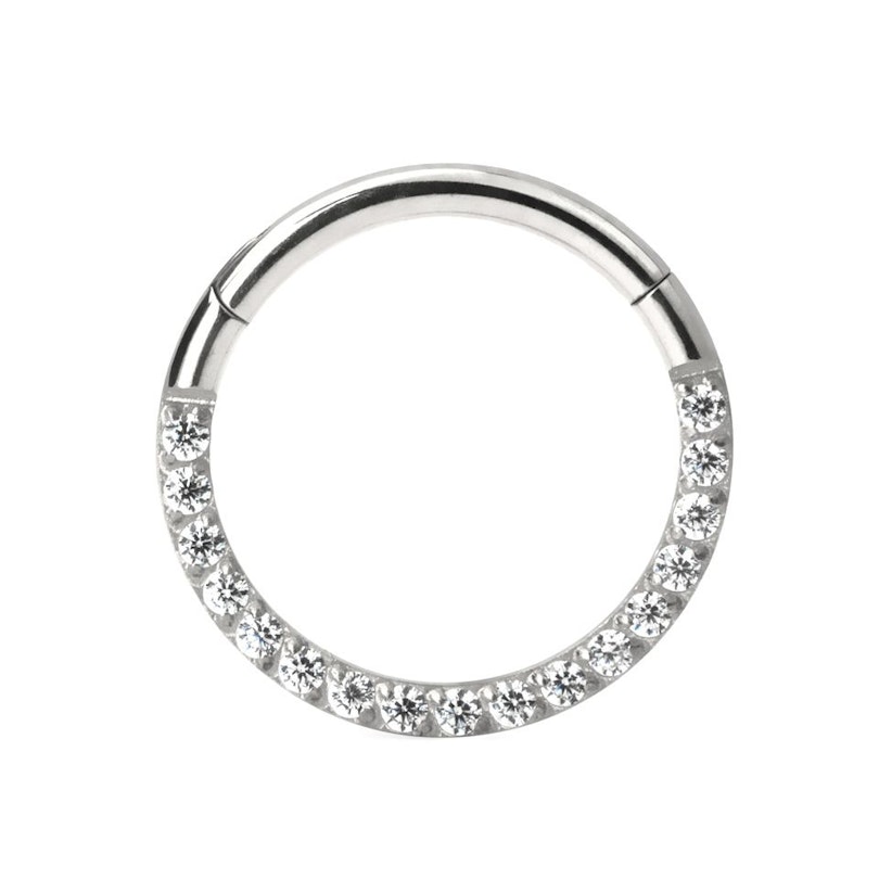 Hinged ring made of titanium with row of stones Piercings