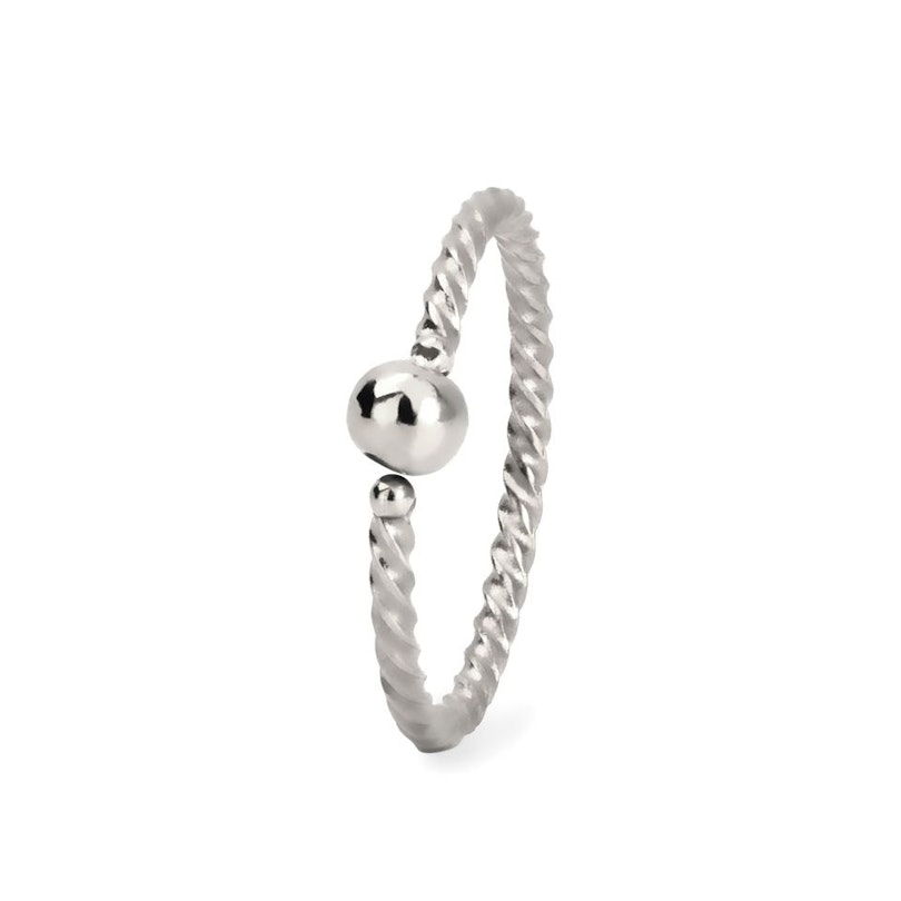 Ring with twisted band and fixed ball Body Jewelry