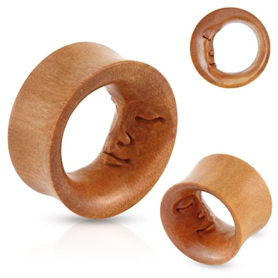 Tunnel made of wood with moon face