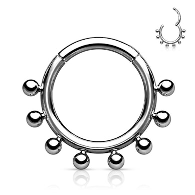 Ring made of titanium with a hinge and outer beads