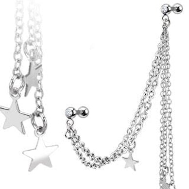 Tragus and helix piercing with stars and chains