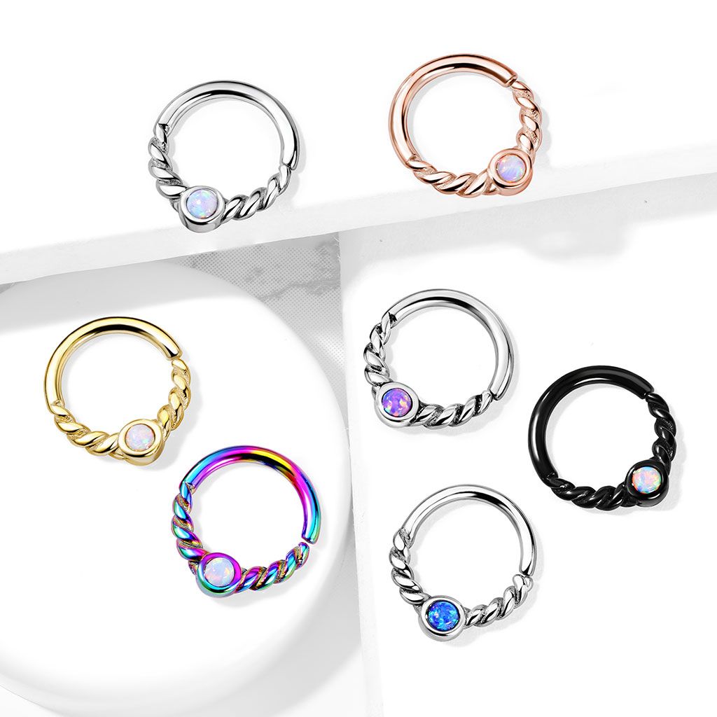 Ring with twisted semicircle and opal stone