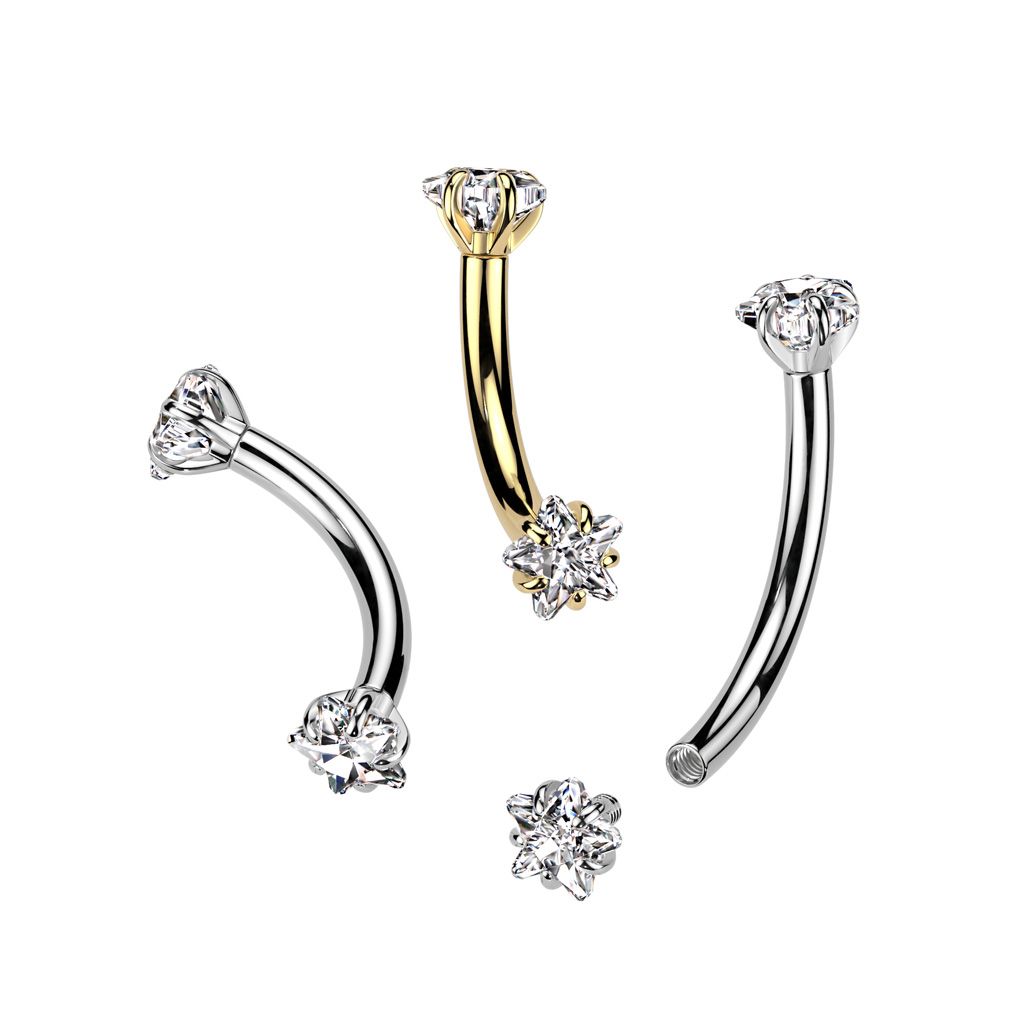 Curved barbell with star shaped CZ stones in titanium
