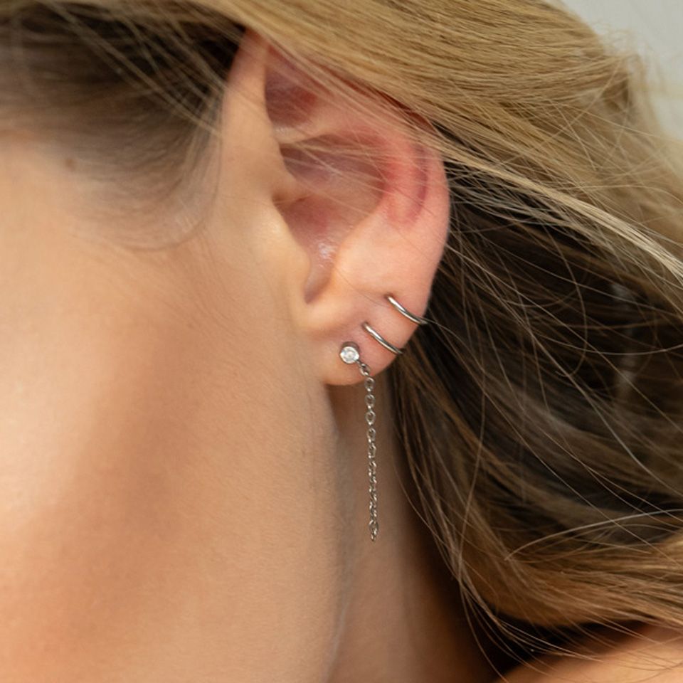 Dainty titanium labret with stone and chain dangle