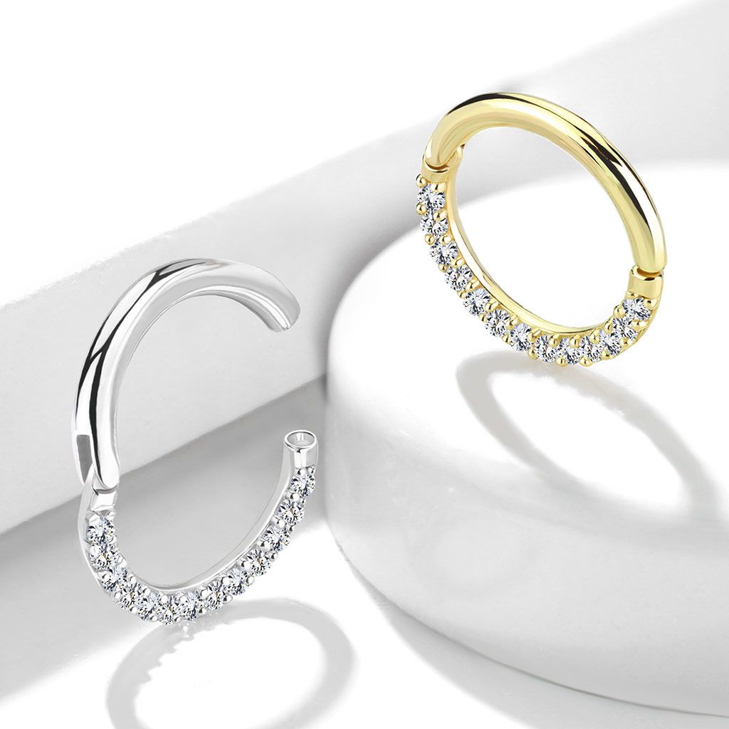Clicker ring made of solid 14k gold with zirconia channel