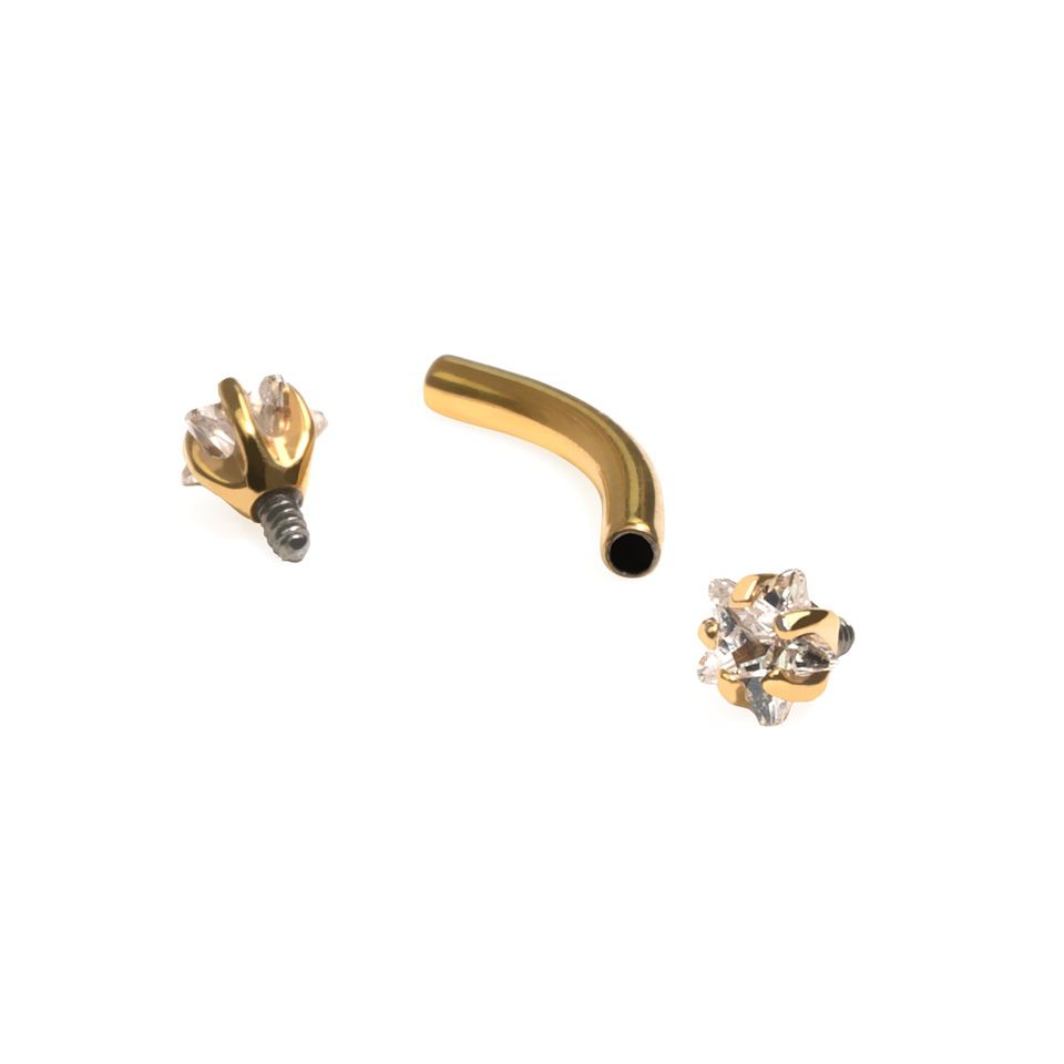 Curved barbell with star shaped CZ stones in titanium
