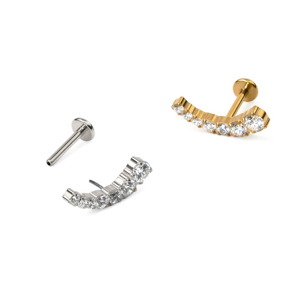 Titanium push-in labret with curving top and stones