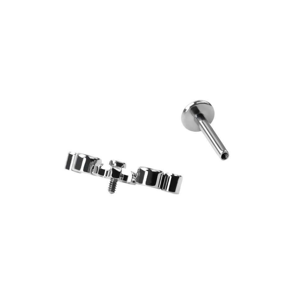 Titanium labret with central flower and CZ stones