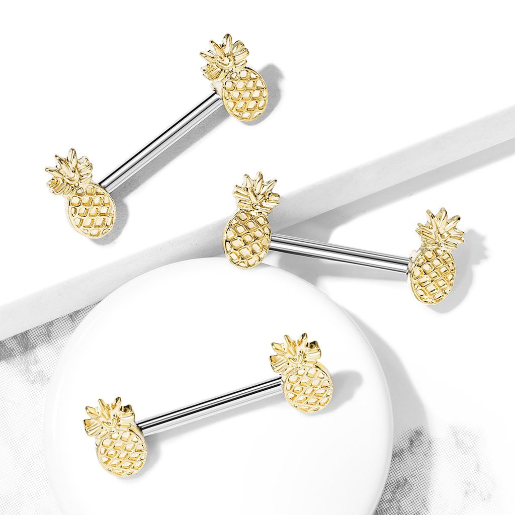 Nipple piercing with pineapples in the ends