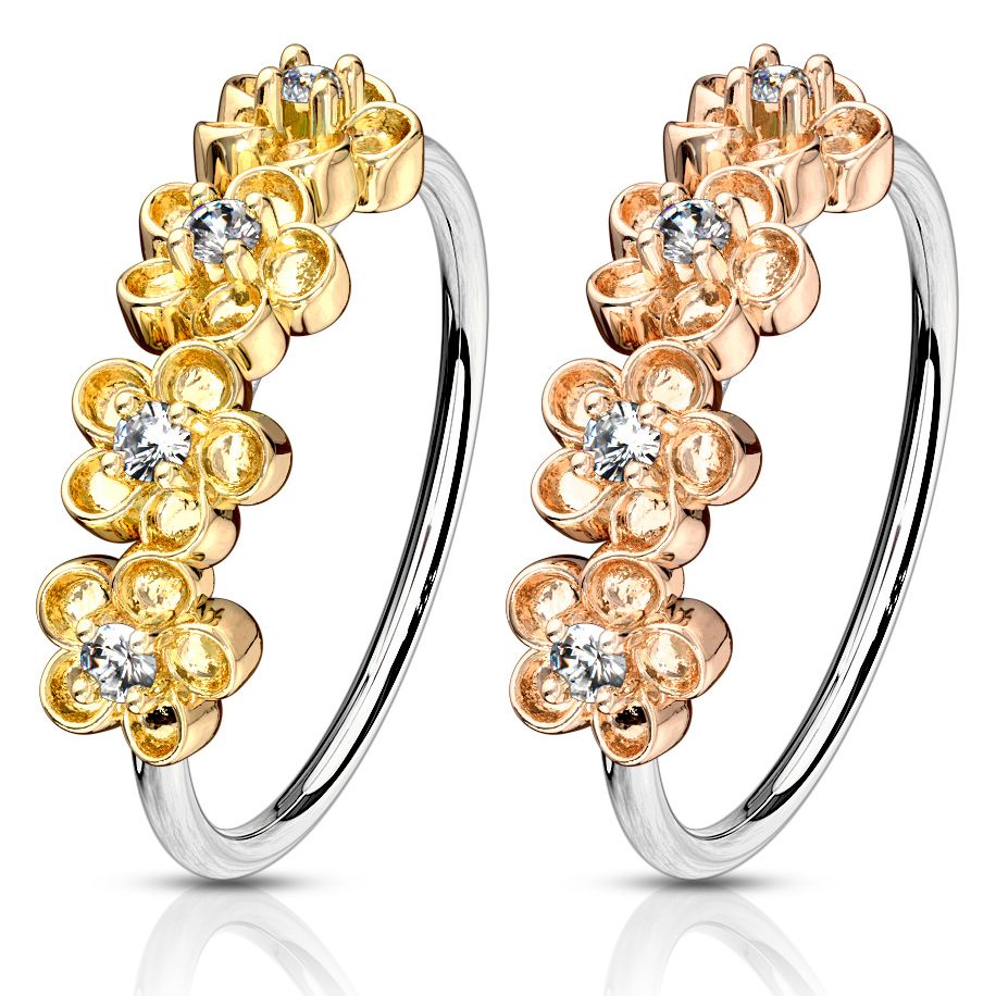Ring with four flowers on the side with stones
