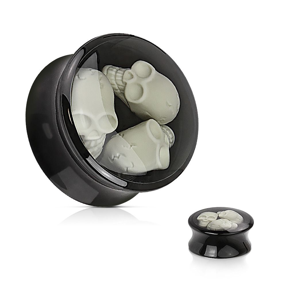 Plug made of acrylic with three skulls