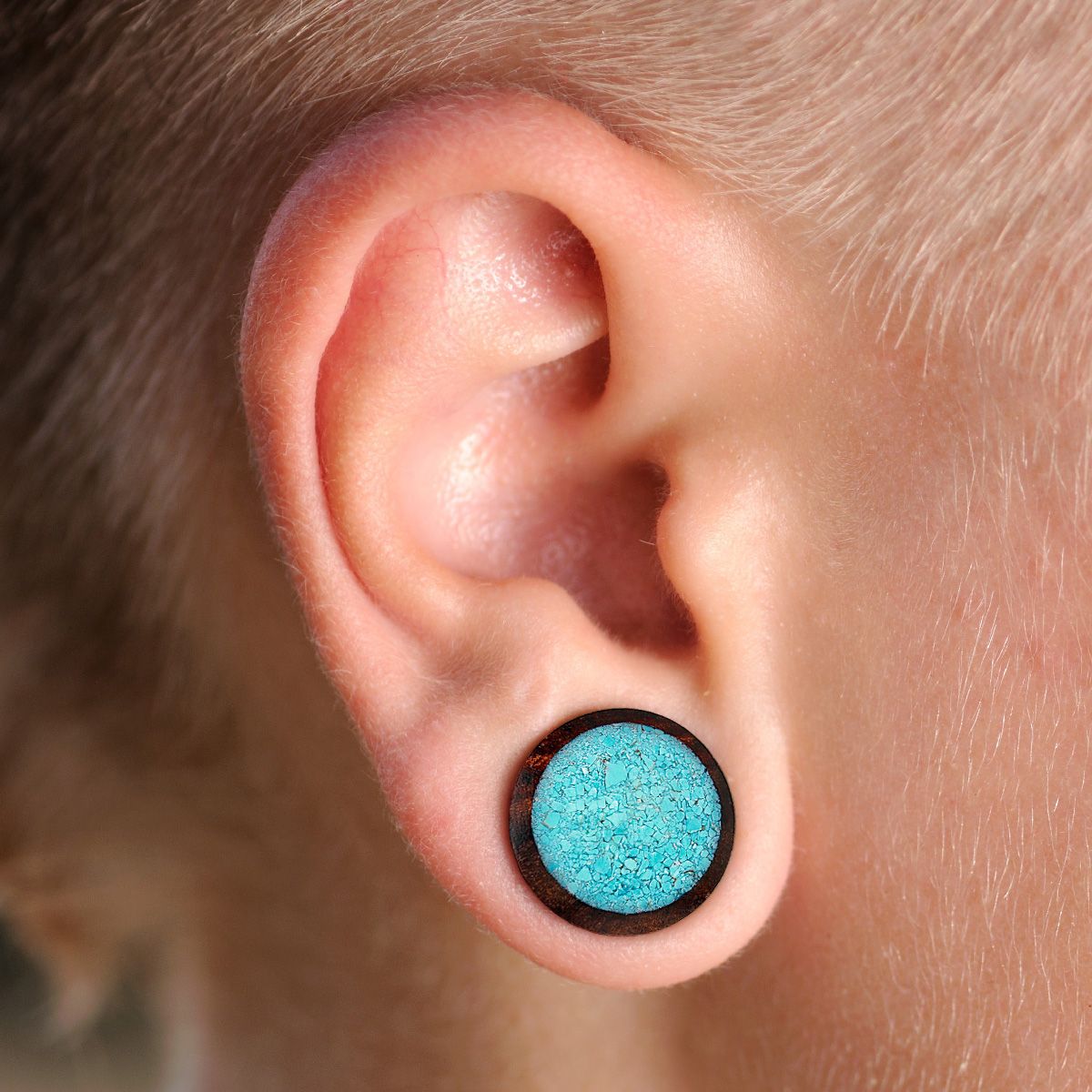 Plug made of wood with broken look turquoise stone