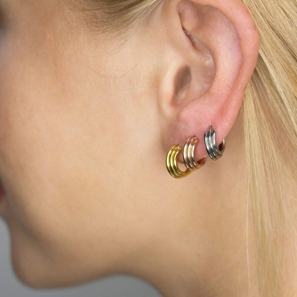 Triple layered hinged ring