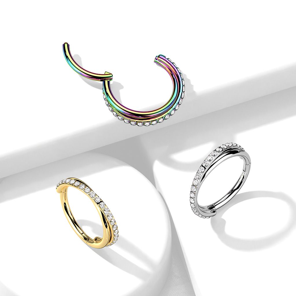 Hinged segment ring with stone-paved crossover arch