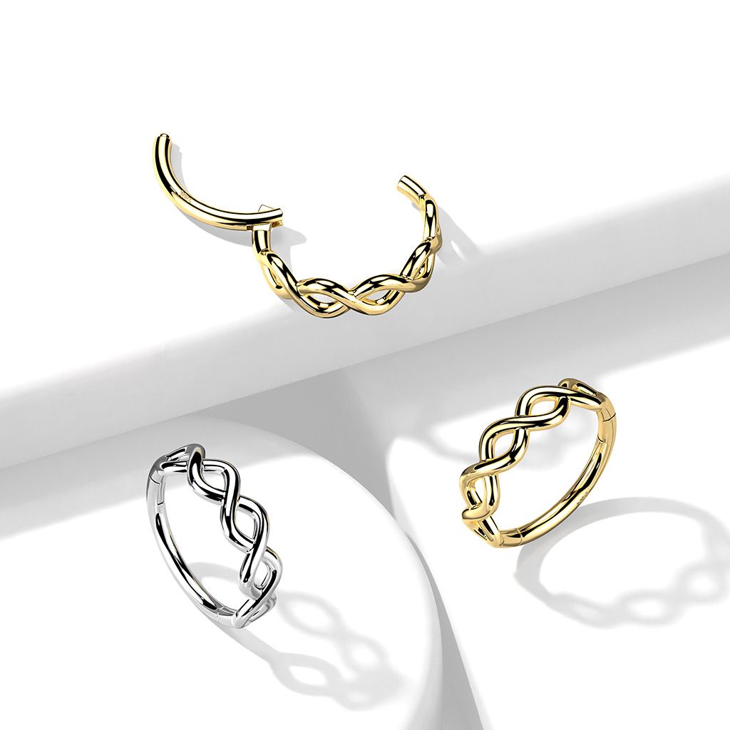 Ring made of 14K gold with a hinge and side facing infinity twist