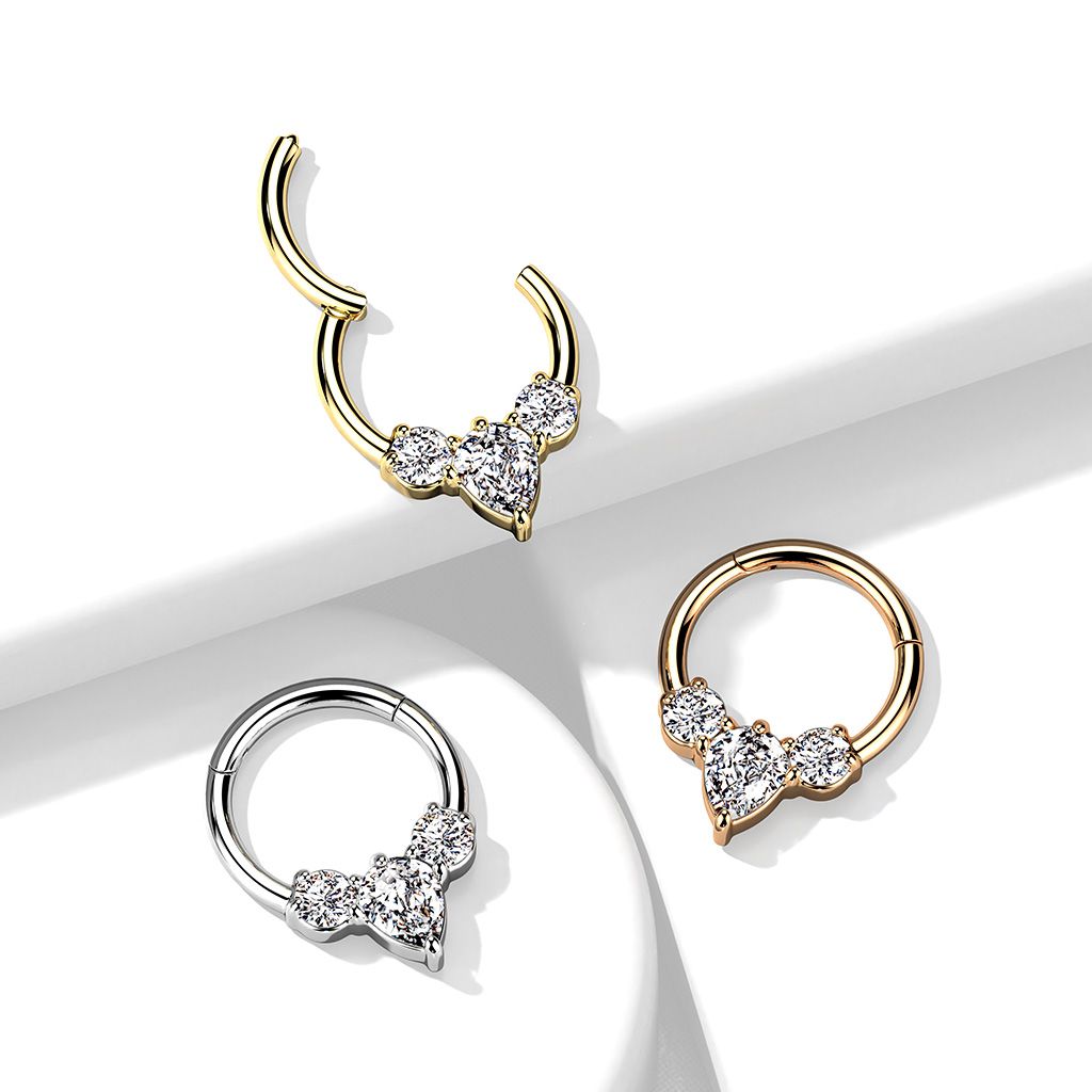 Hinged ring made of surgical steel with pear-shaped centre stone
