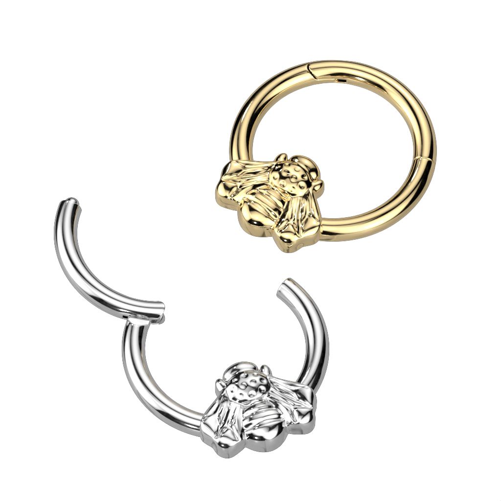 Hinged ring made of titanium with a front-facing bee