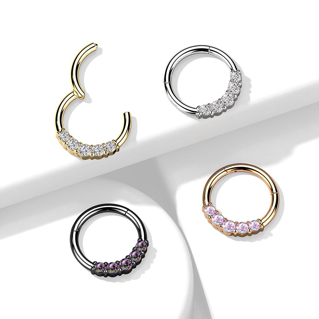 Hinged ring made of surgical steel with five gemstones