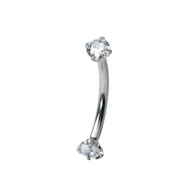 Curved barbell made of titanium with internally threaded gemstone ends