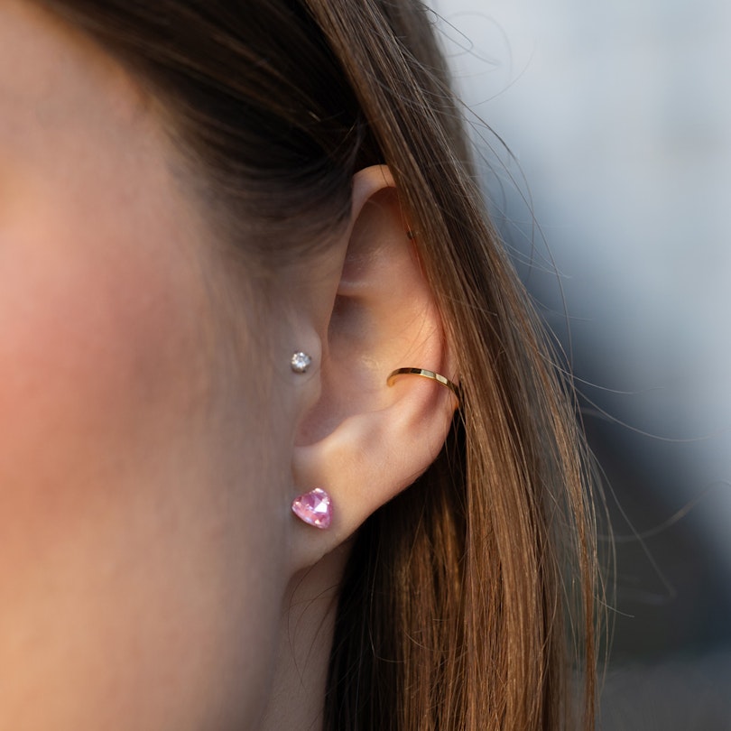 Ear piercing in a variety of stone designs and colors Body Piercing