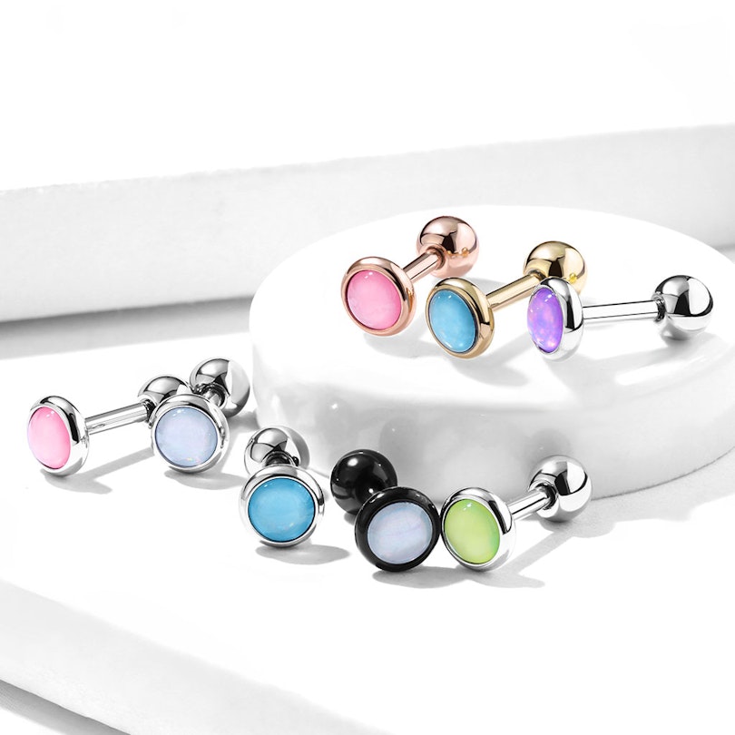 Ear piercing with light reflecting bead Body Jewelry