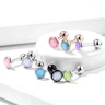 Ear piercing with light reflecting bead Body Jewelry