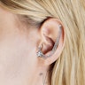 Tragus and helix piercing with single star Piercing