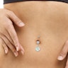 Belly button ring with cube-shaped stone dangle Piercing