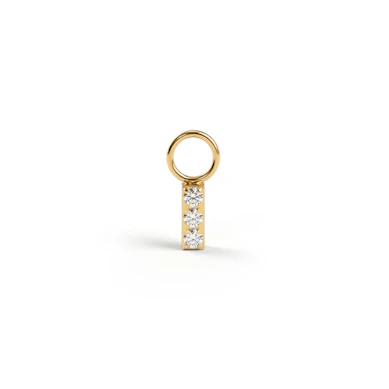 Simple titanium charm with three stones
