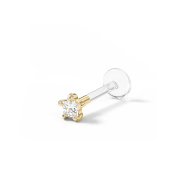 Labret made of 14k gold with star-shaped stone and ptfe post