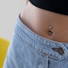 Belly button ring with bottom heart-shaped gem Body Piercing