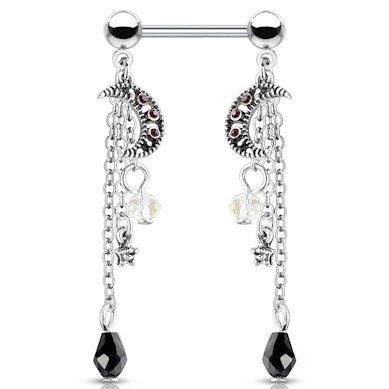 Nipple piercing with stars and moons on pendants