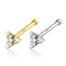 Nose stud made of 14k gold with three little stones Piercings