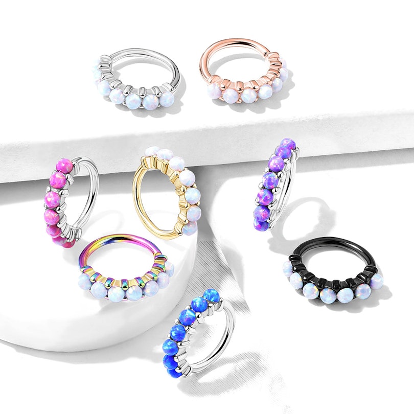 Ring with row of opal stones Body Piercing