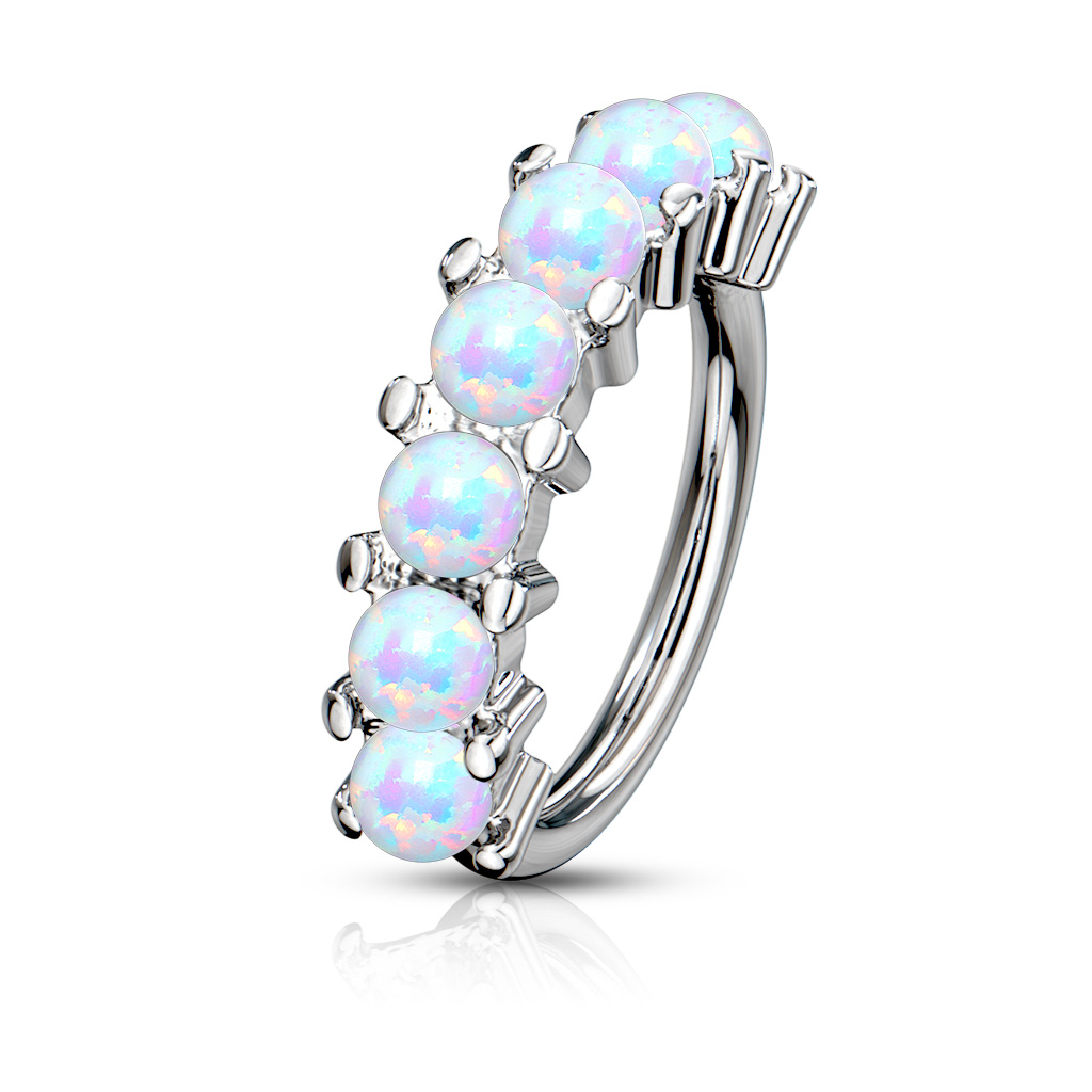 Ring with row of opal stones Piercings