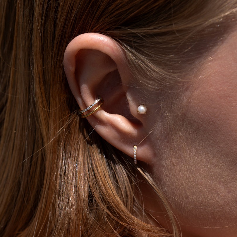 Titanium hinged ring with pave pearls Piercing